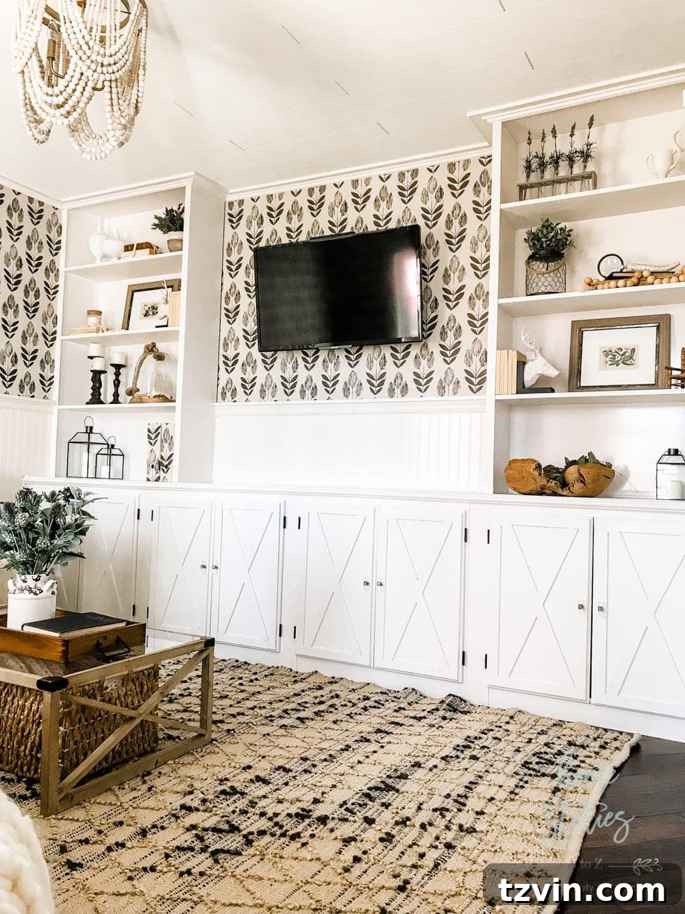 Beyond the Screen 12 Ways to Style Your TV Space 17 Stylish wallpaper applied to the wall behind a television to enhance decor