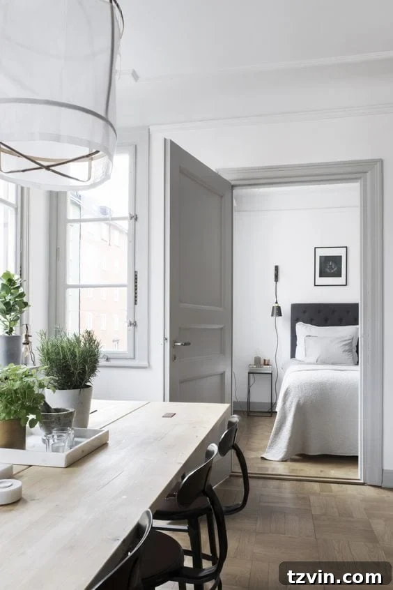 Elevate Your Space: Paint Colors Designed for Gray Trim 7 A dining area featuring a harmonious blend of light walls and mid-tone gray trim, showcasing a balanced and inviting aesthetic.