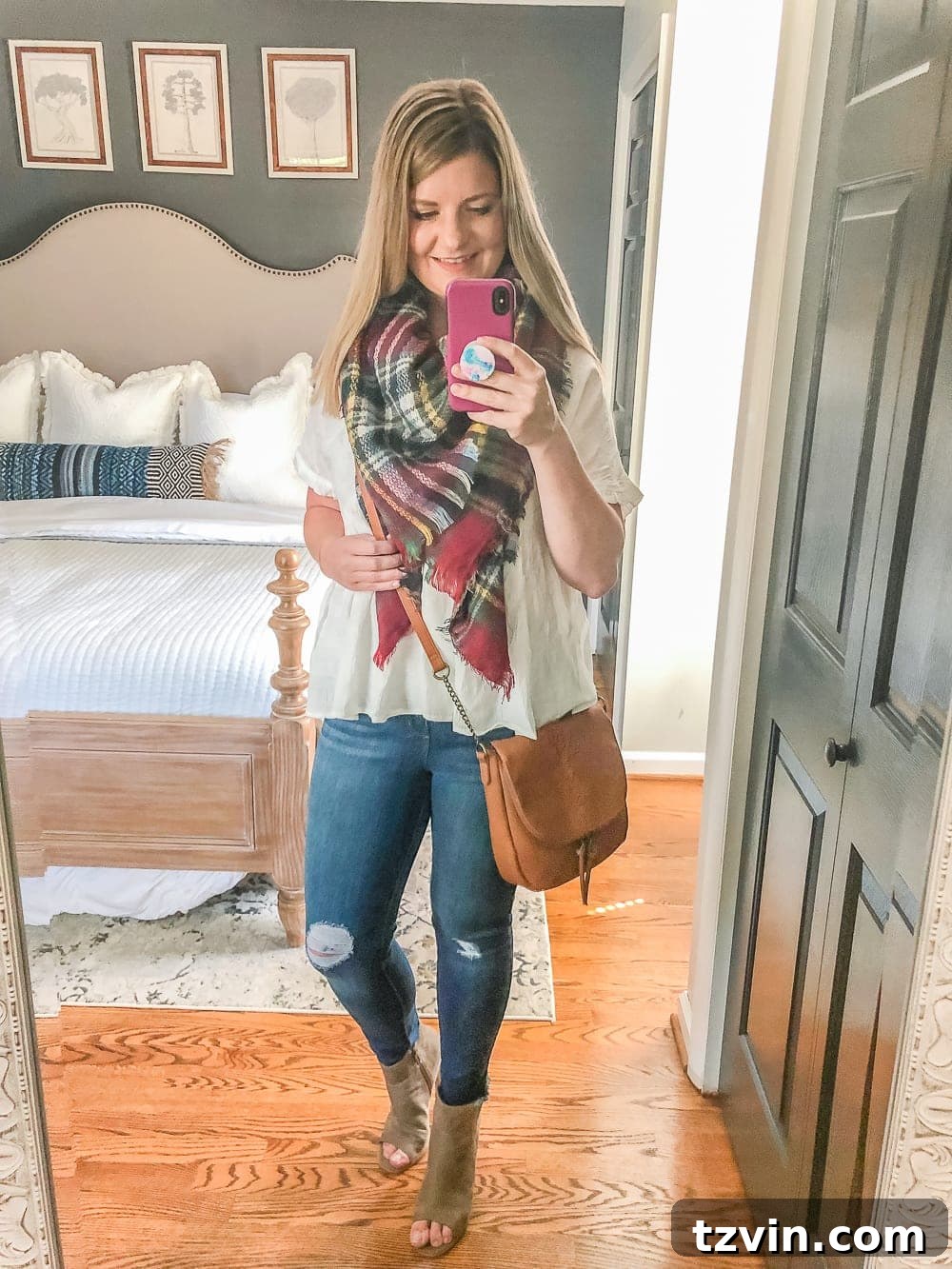 Chic & Cheap: 7 Fall Outfits to Smooth Your Silhouette 4 7 Inexpensive Tummy Hiding Mom Friendly Fall Outfits - flowy peplum blouse, plaid scarf, cognac crossbody bag, distressed jeans, peep toe booties
