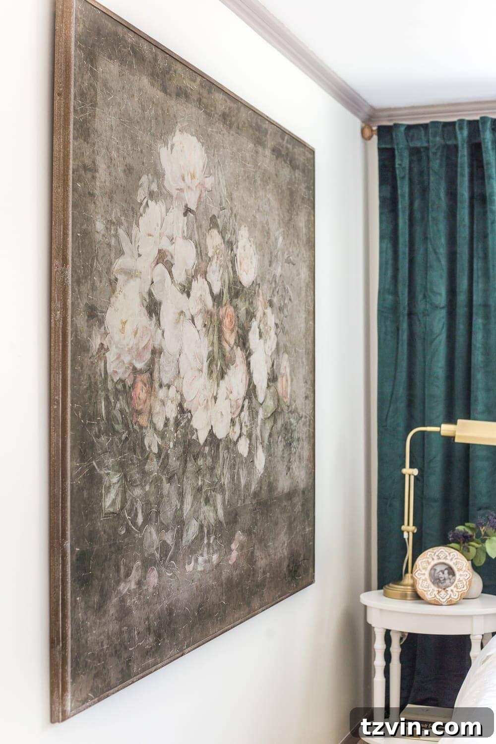Guest Bedroom Grandeur: Vintage Chic Statement Art 4 Guest bedroom with statement art and round end tables, inviting decor