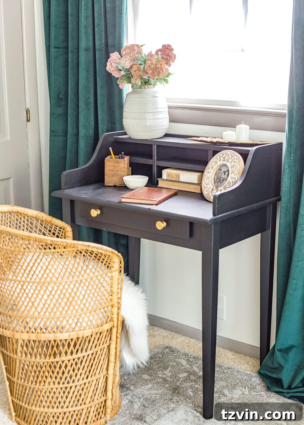 Our Guest Retreat Transformation Unveiled 9 Close-up of the elegant vintage writing desk, adorned with simple decor, highlighting its transformation and functional role in the guest bedroom.