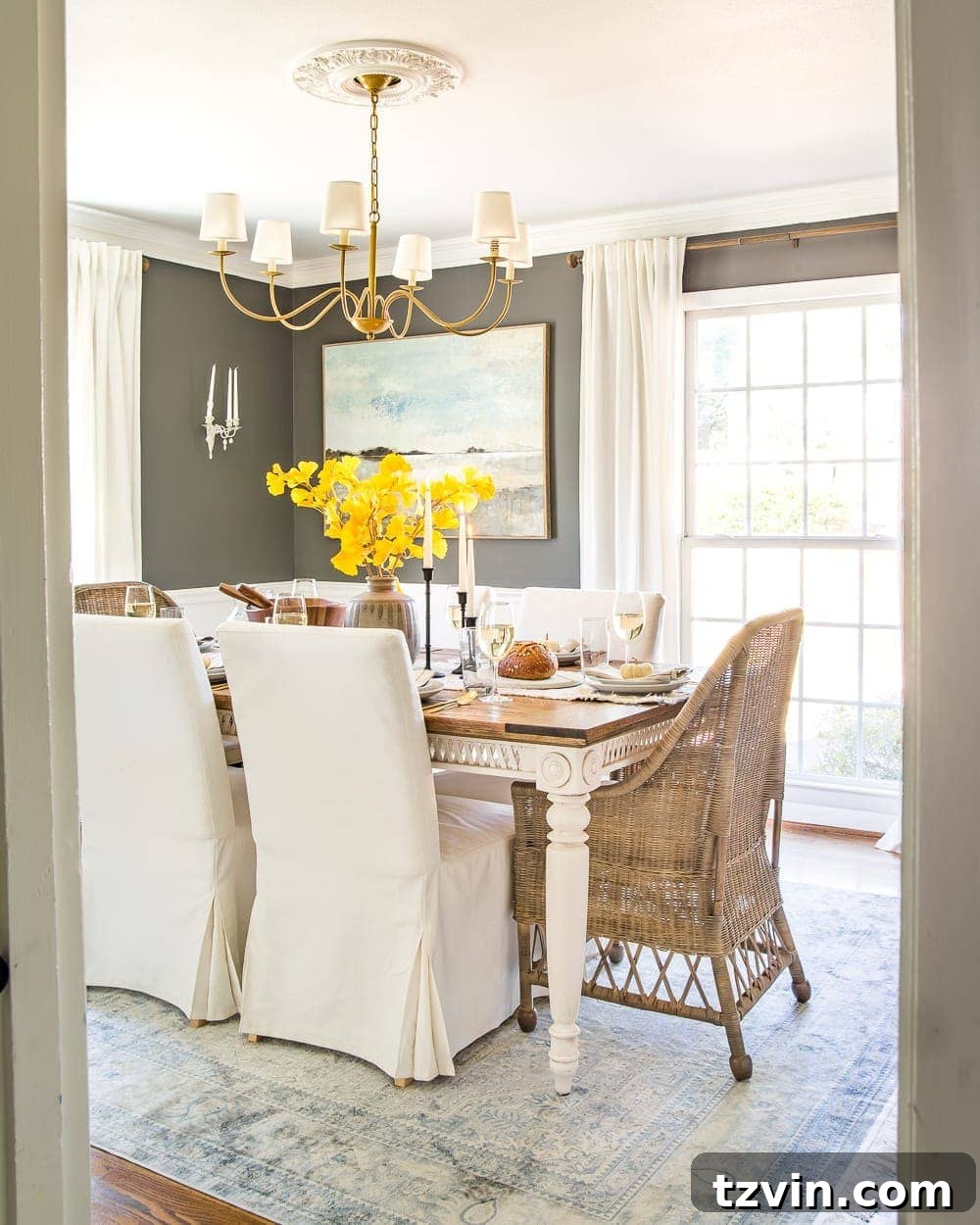 8 Clever Essentials for an Effortless Thanksgiving Table 2 Modern meets traditional fall dining room set for Thanksgiving, showcasing versatile decor.