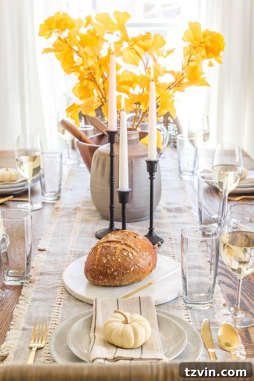 8 Clever Essentials for an Effortless Thanksgiving Table 6 Large wooden bowl for serving and seasonal decor.