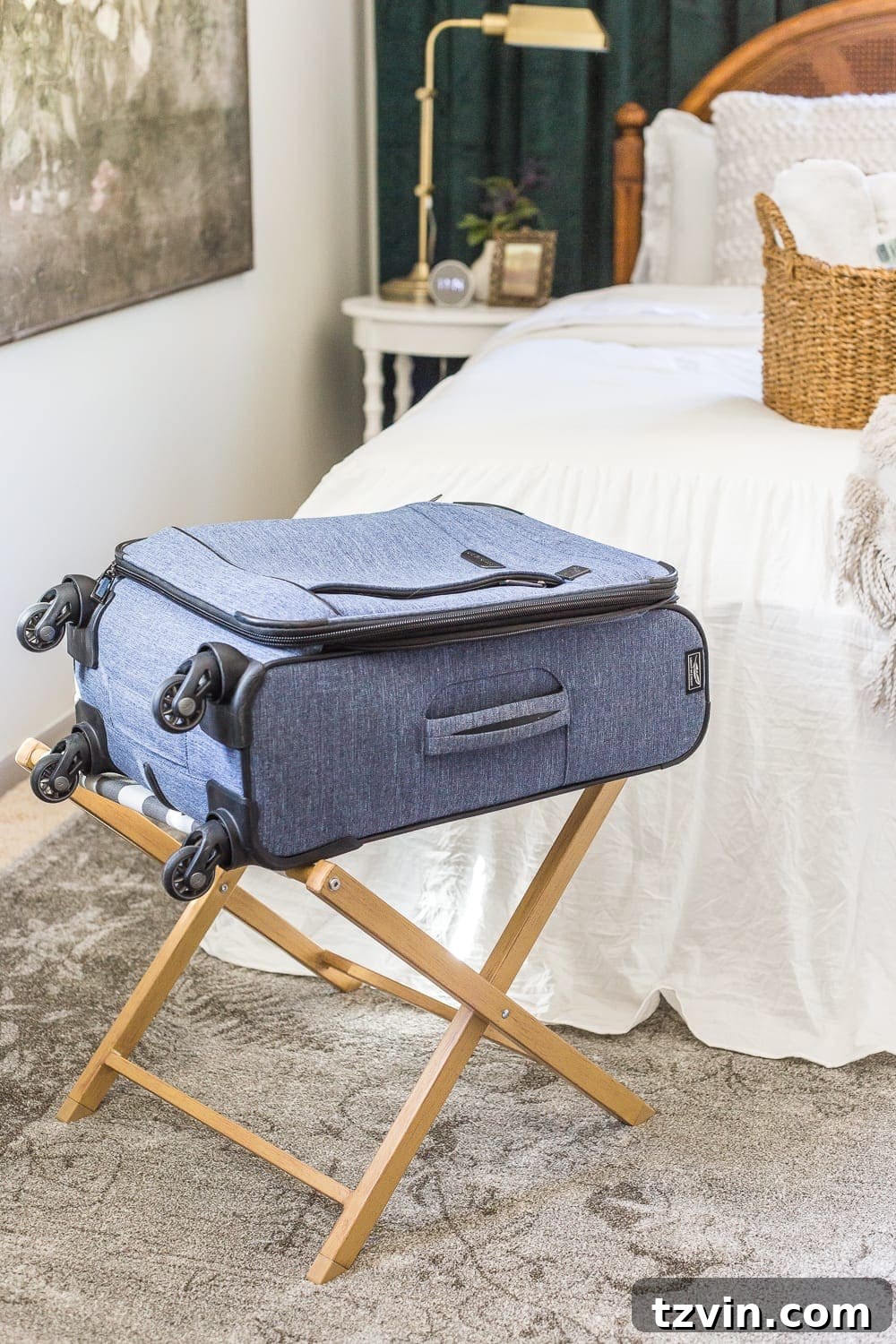 A luggage rack with an open suitcase, demonstrating a practical and helpful amenity for guests to organize their belongings.