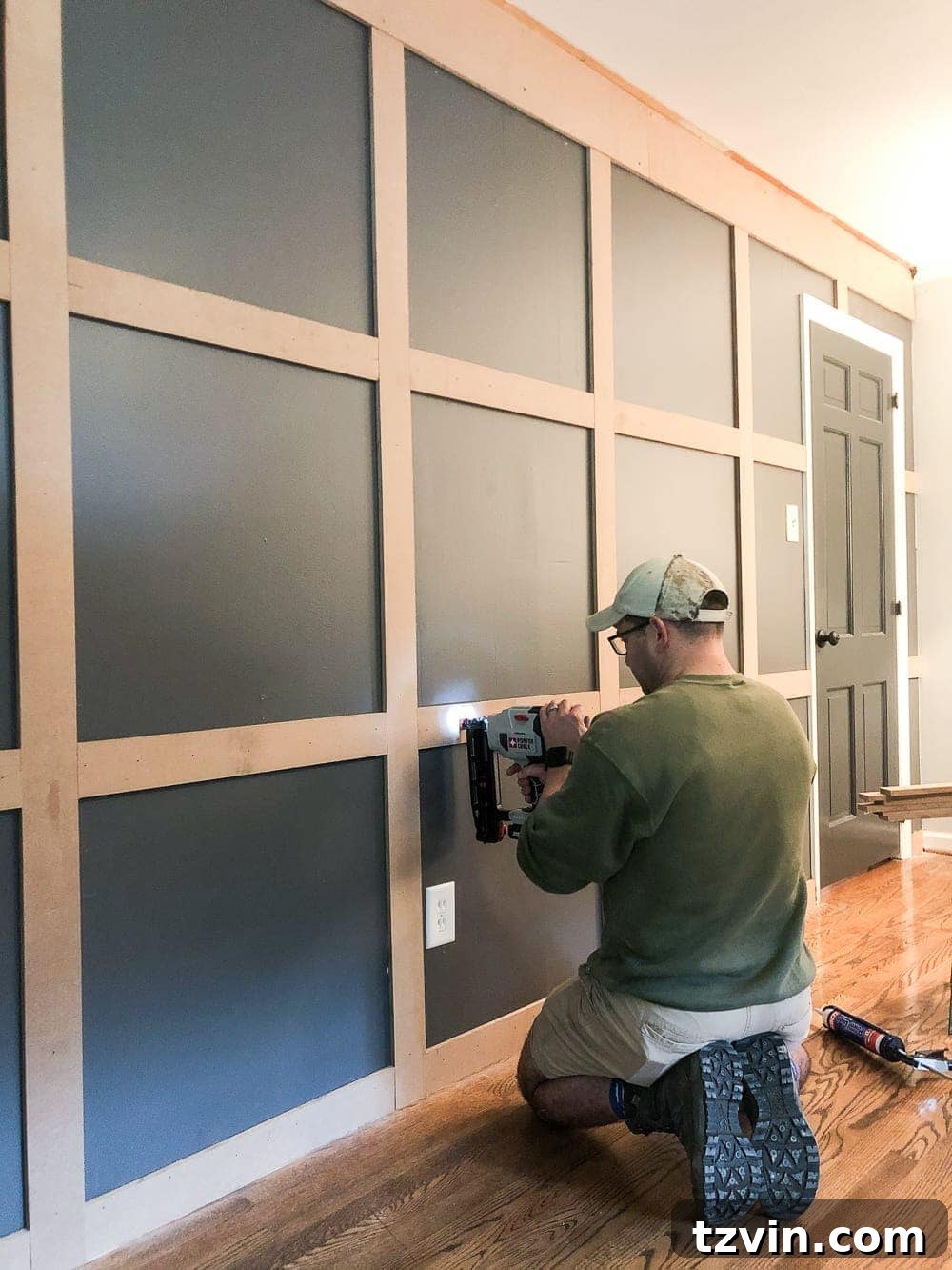Installing horizontal MDF boards to complete the grid molding framework