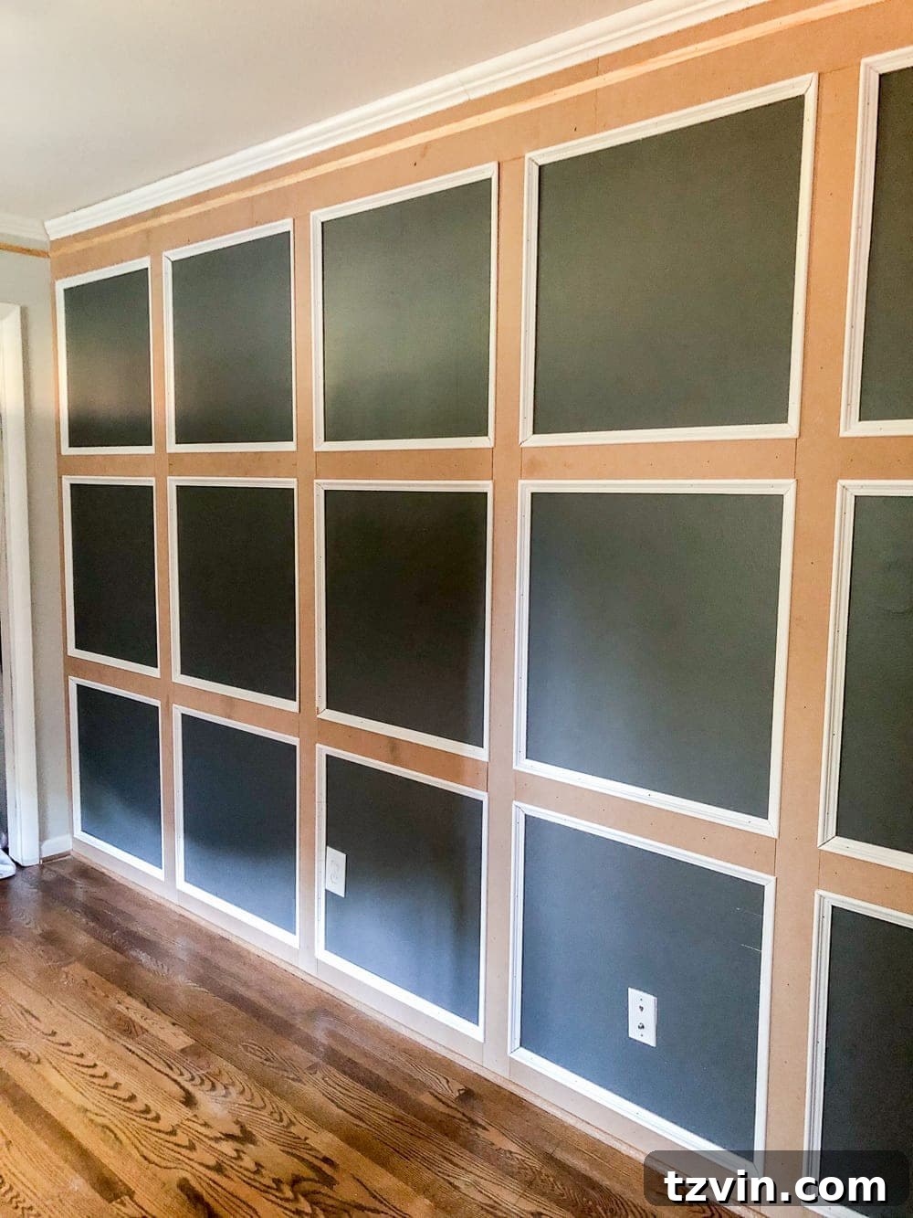 Grid molding focal wall in progress, ready for final paint