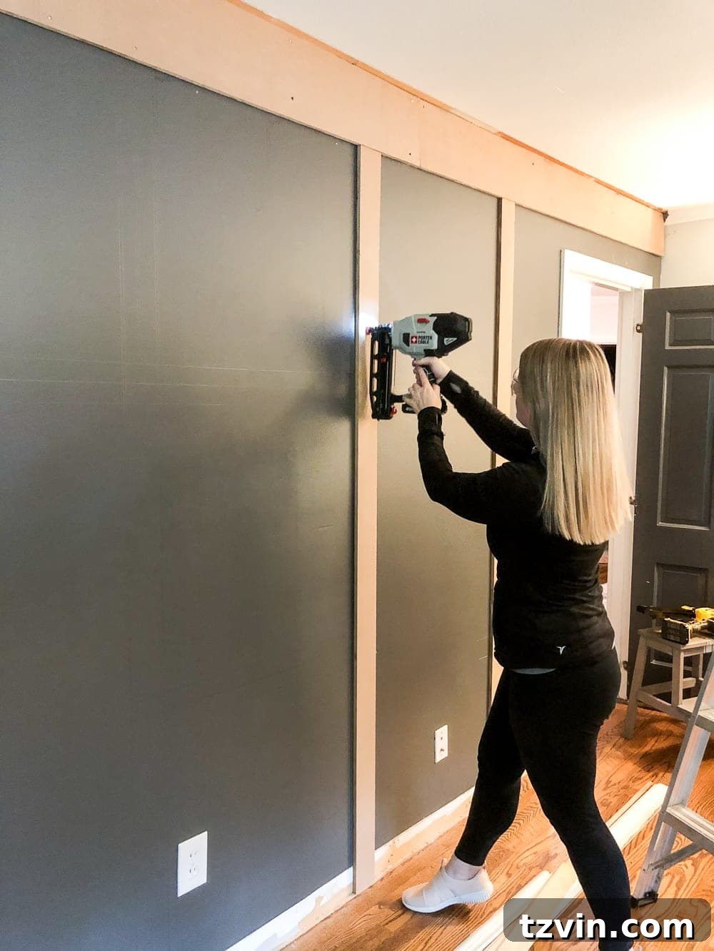 Nailing a vertical MDF board to the wall for grid molding