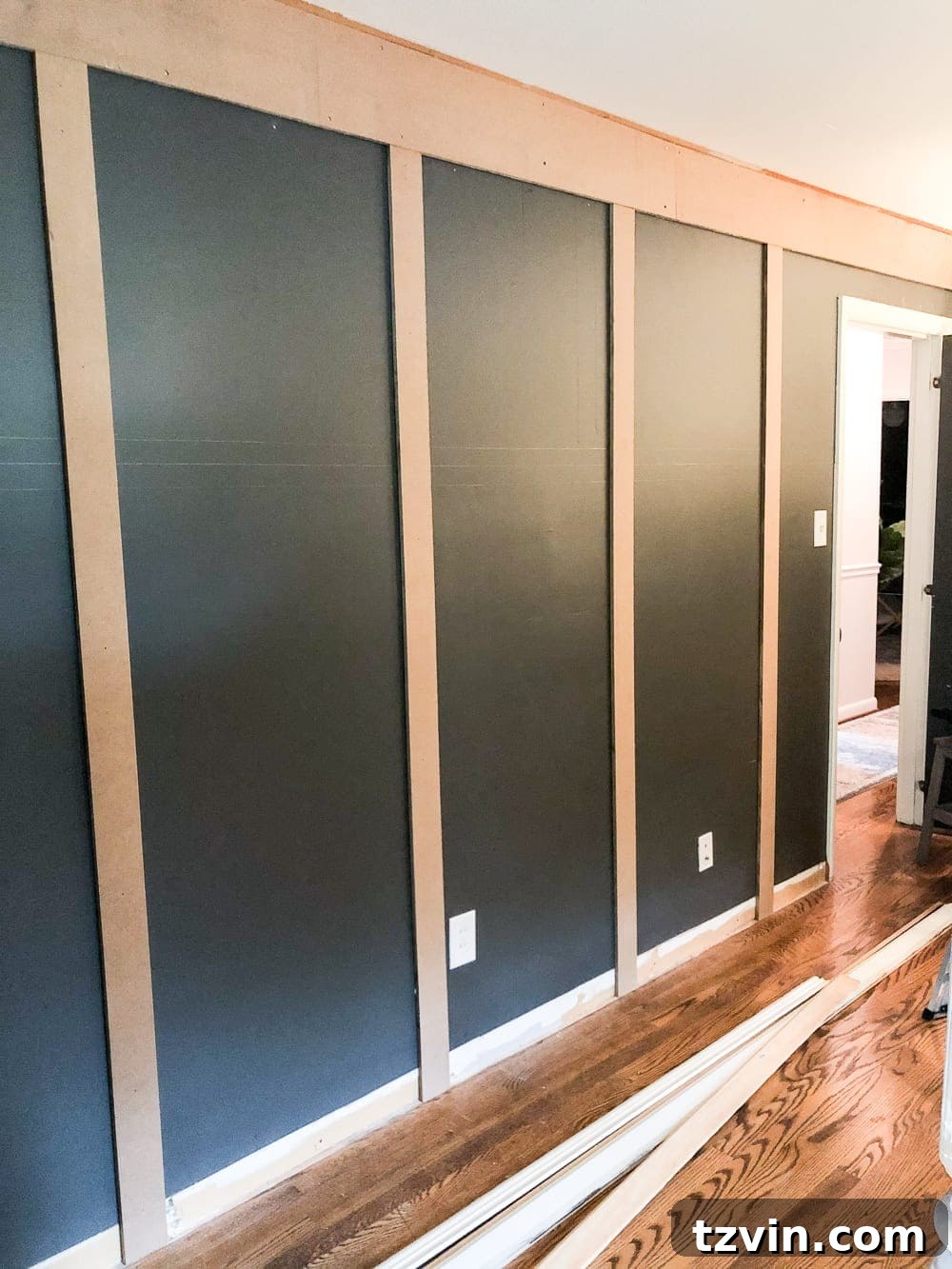 All vertical grid molding boards installed on a wall