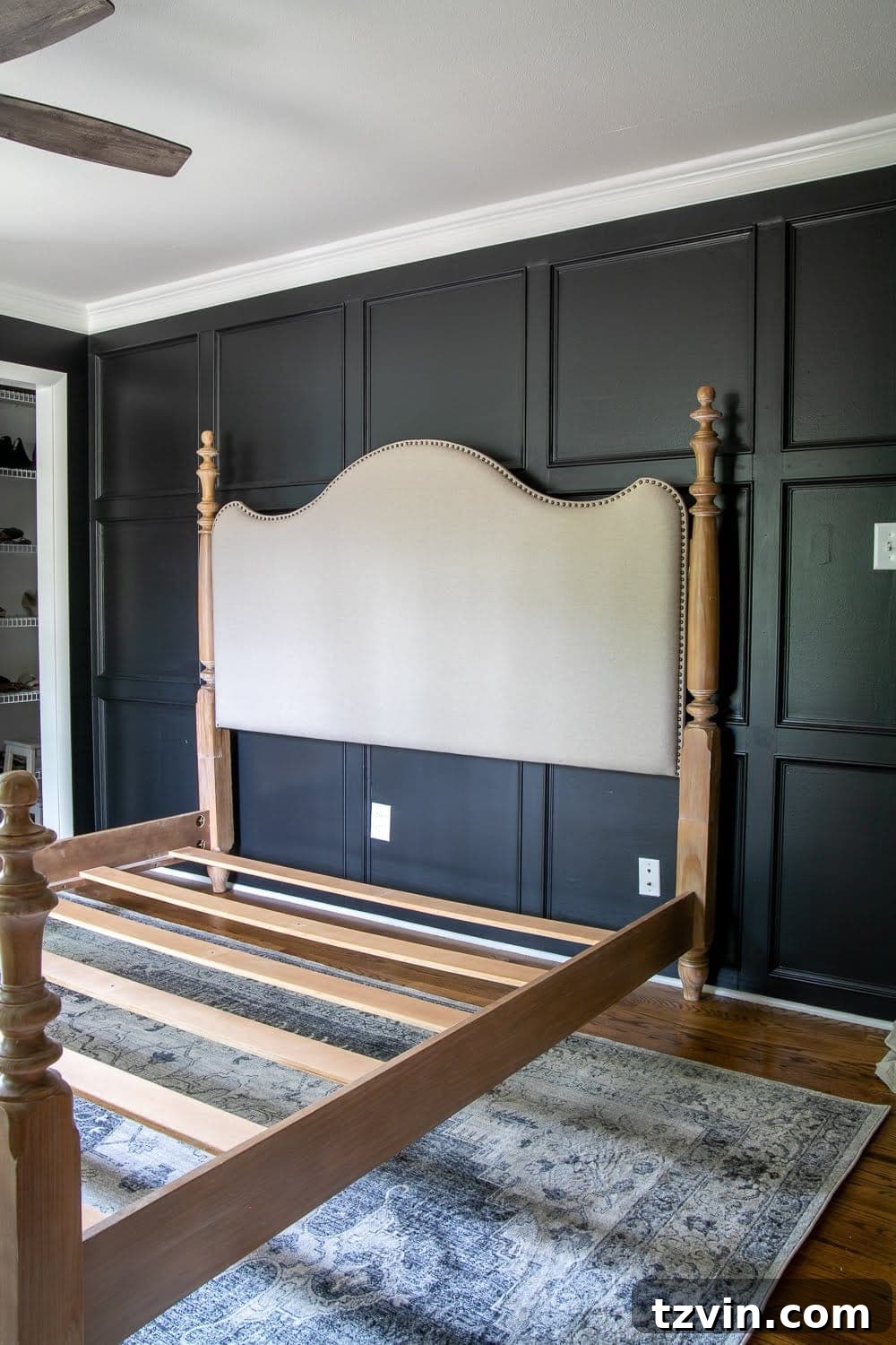 Master Bedroom Transformation: 5 Hard-Earned Painting Insights 2 A beautifully painted black master bedroom with molding, showing the transformative power of proper primer and paint application.