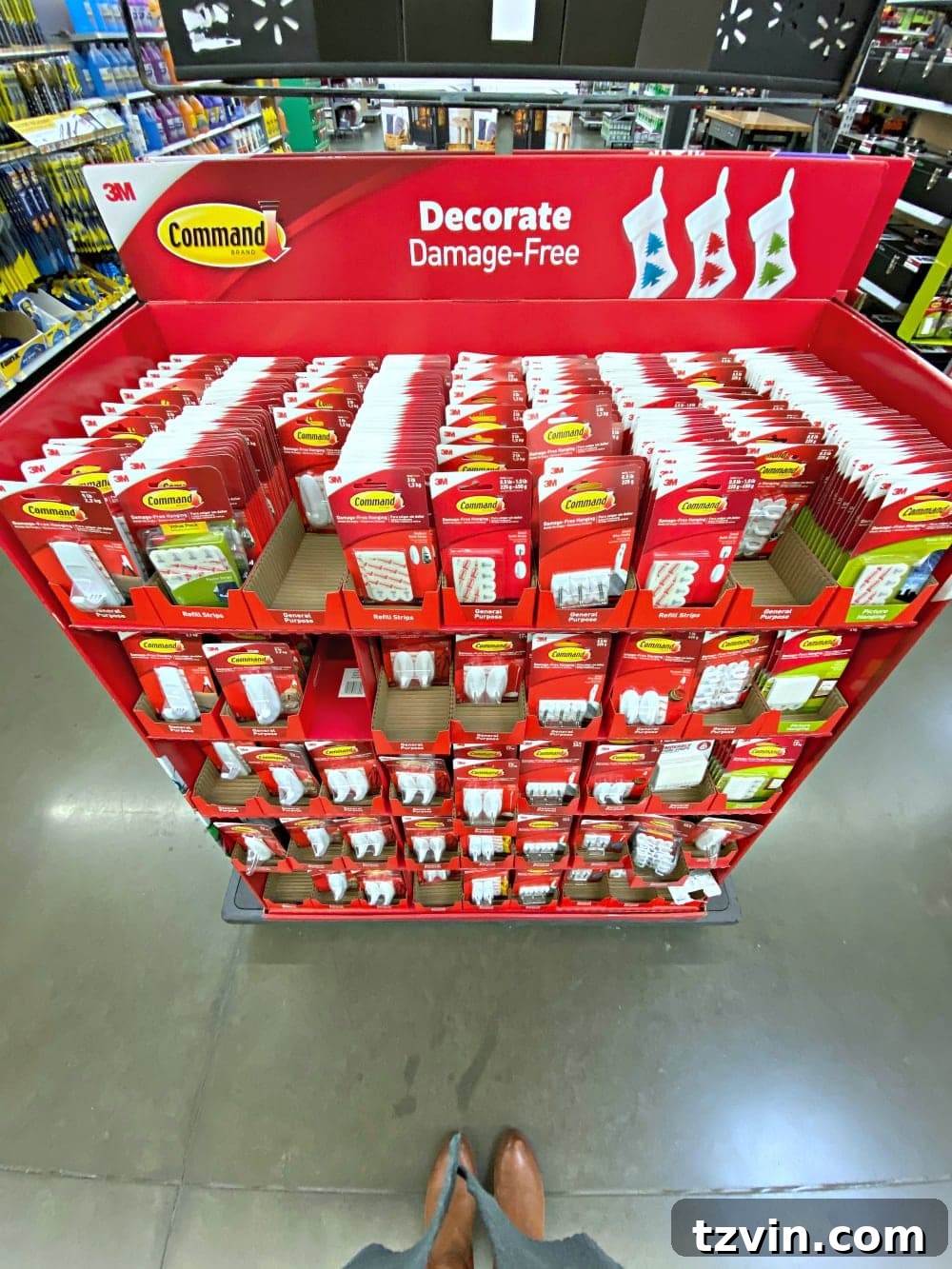Close-up of Command hooks displayed in their packaging, ready for use in a DIY project.