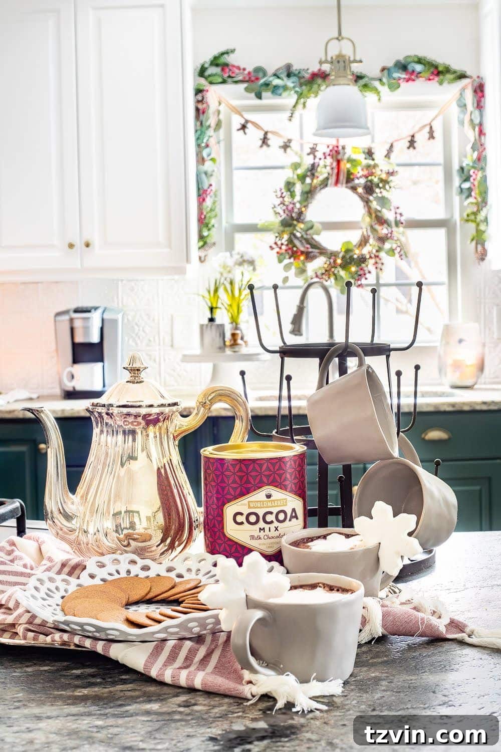 Swedish Christmas Charm: Blending Sentimental Decor with Modern Touches 4 Christmas kitchen setting featuring an heirloom silver teapot used as a hot cocoa station, surrounded by festive mugs and treats.