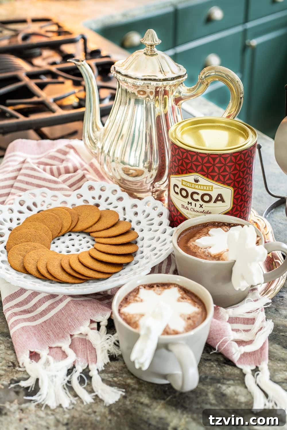 Swedish Christmas Charm: Blending Sentimental Decor with Modern Touches 5 Detailed shot of a Christmas kitchen hot cocoa vignette, showcasing festive mugs, cocoa mix, and marshmallow toppers.