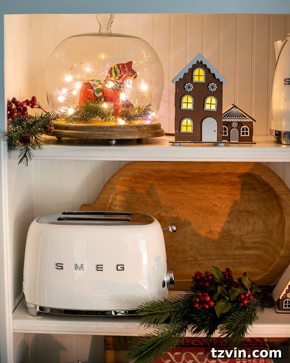 Swedish Christmas Charm: Blending Sentimental Decor with Modern Touches 6 Swedish Christmas kitchen shelves styled with a Dala horse under a cloche, surrounded by gingerbread and festive accents.