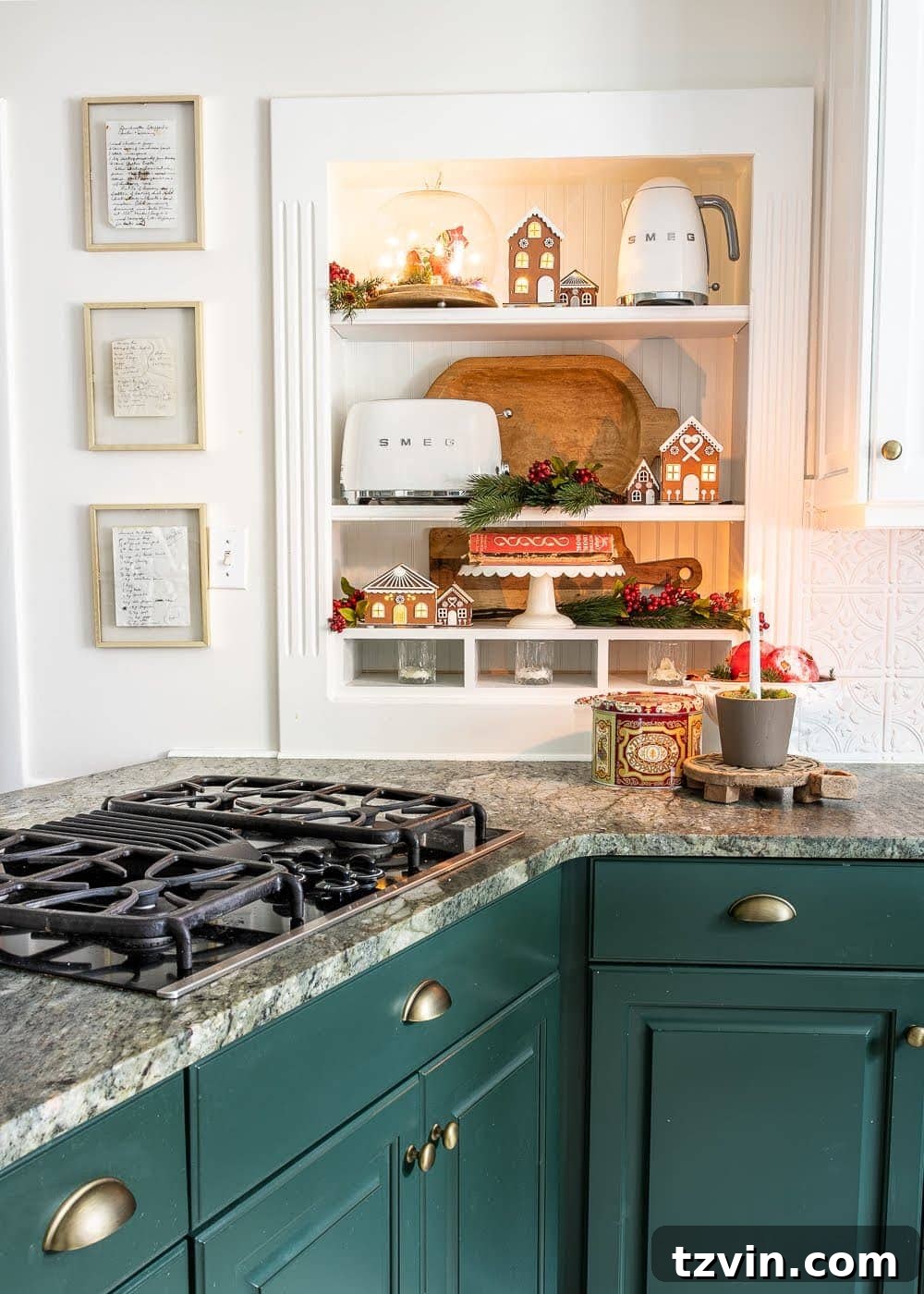 Christmas kitchen shelves with framed handwritten recipes from past generations