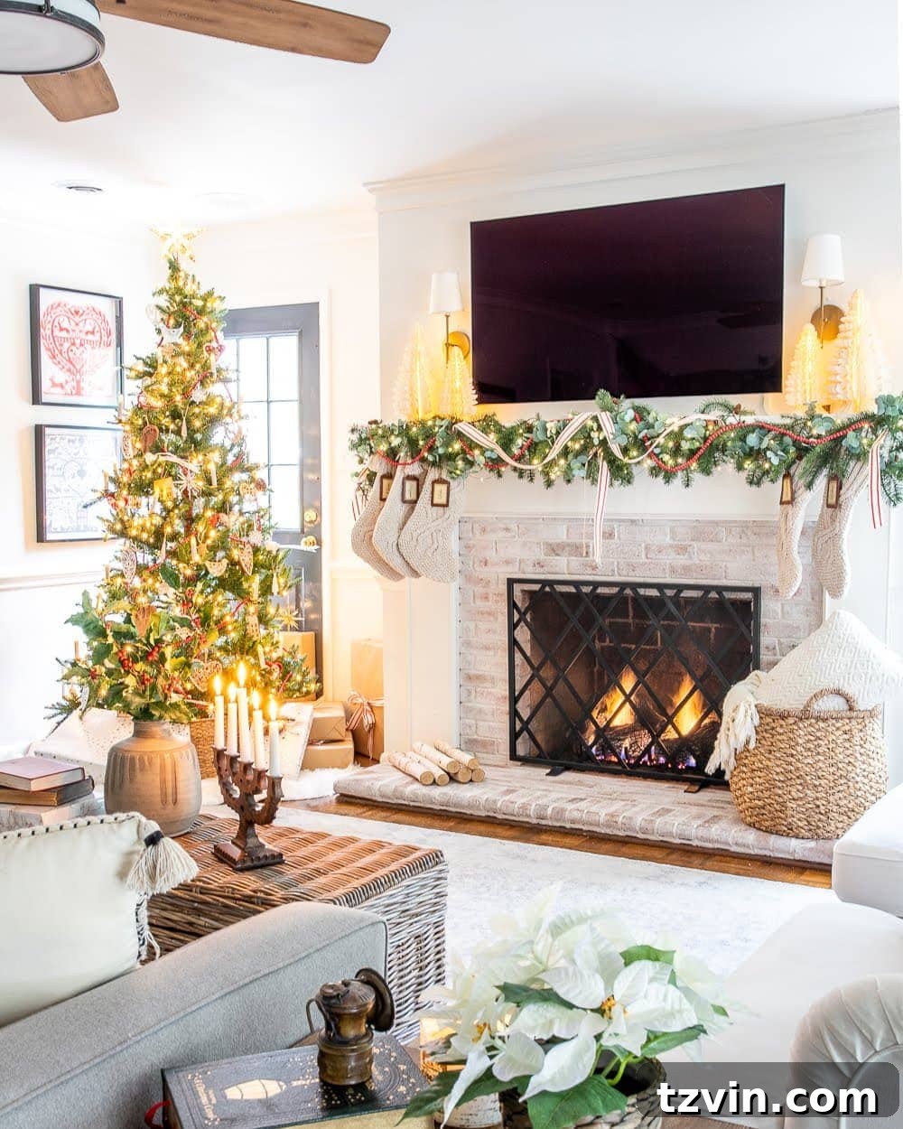 Christmas decor ideas: Vintage modern living room mantel with TV and Christmas tree