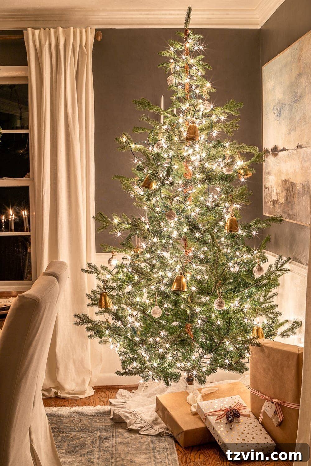 Enchanted Holiday Evenings 2019 9 Christmas tree at night, surrounded by presents and festive glow