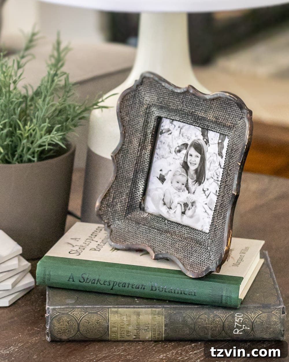 Simple Styling: End Table Inspiration 5 how to style end tables - using picture frames and books as risers