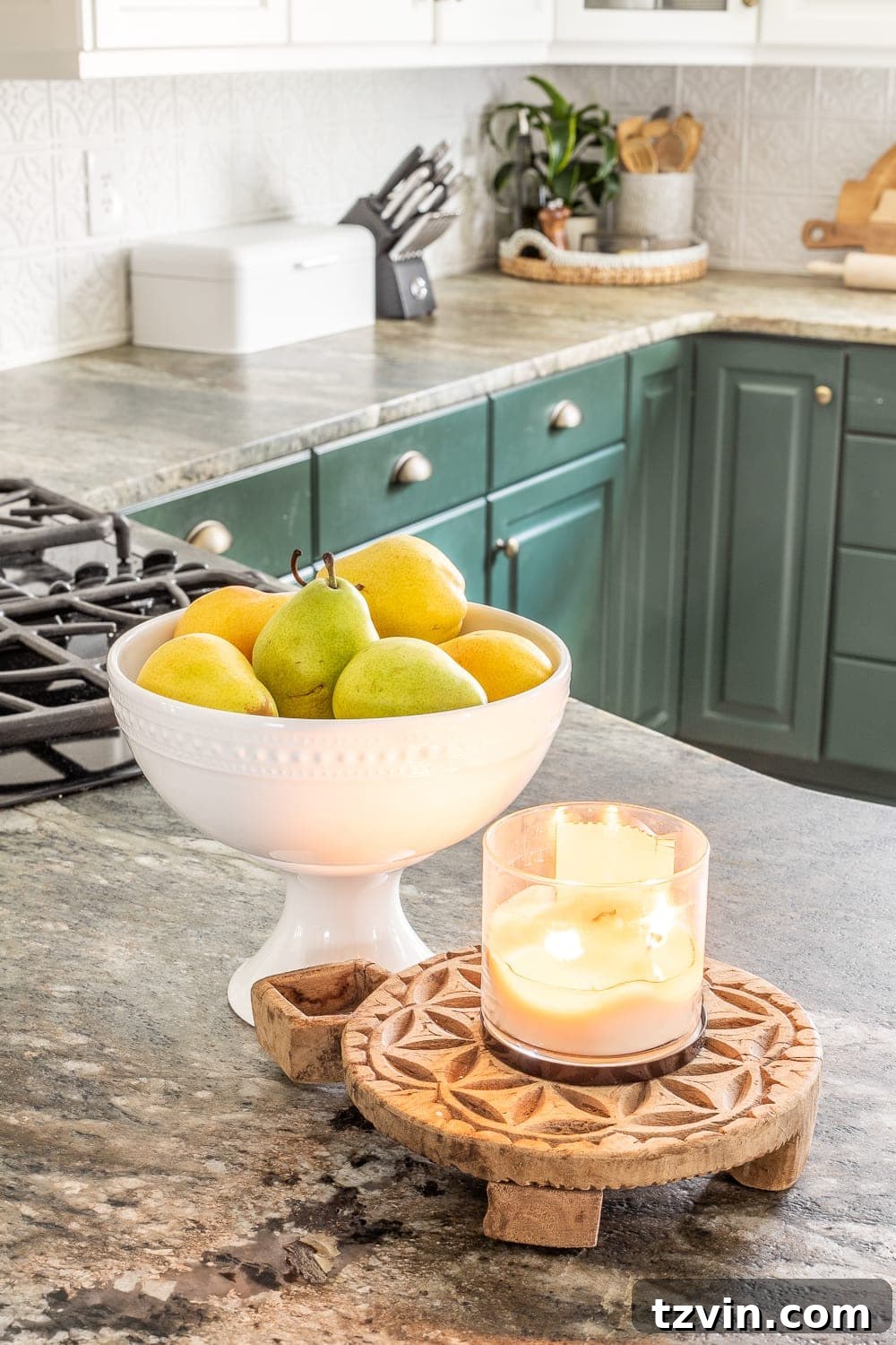 Stylish Countertops Made Simple 6 Kitchen counter decor with a lit candle and a fruit bowl