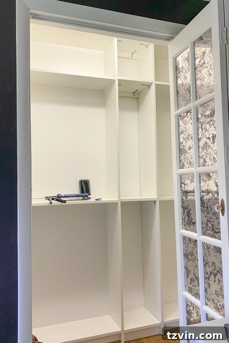 IKEA Billy Kitaplıklarla Gardırop Dönüşümü: Kendin Yap Fikirleri 12 Adding height extenders and anchoring Billy bookcases and PAX unit to the wall.