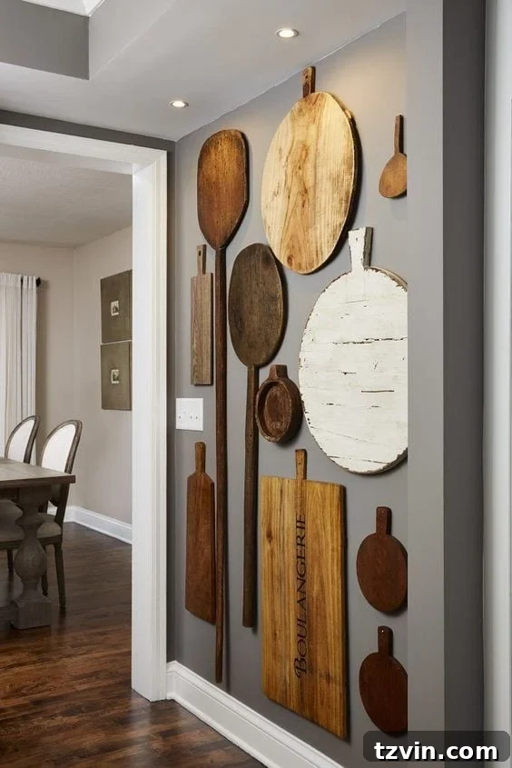 Craft Your Style: DIY Wall Decor Projects to Personalize Your Home 19 cutting boards hung as a kitchen gallery wall for a rustic touch