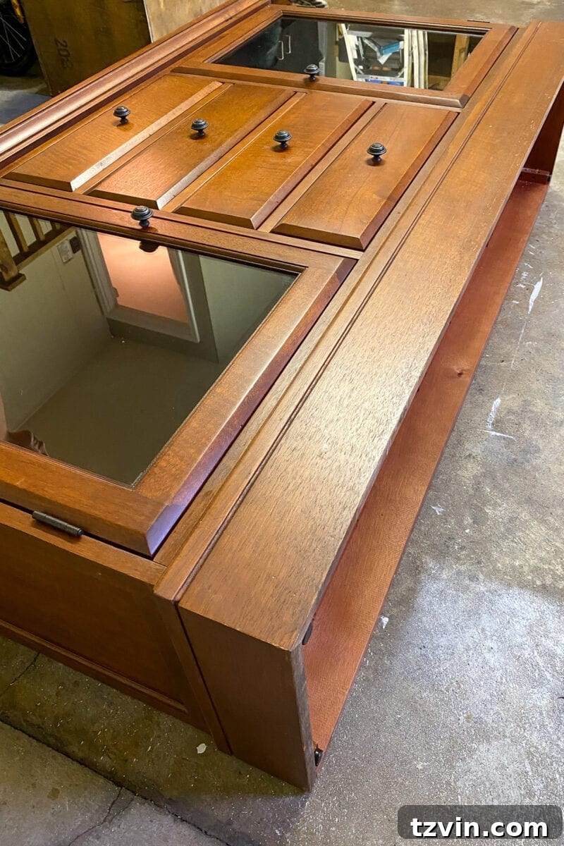 Chic Transformation of a Footed Grasscloth Buffet 2 Before & After: Footed Grasscloth Buffet Makeover - A bulky thrifted piece transformed into modern glam