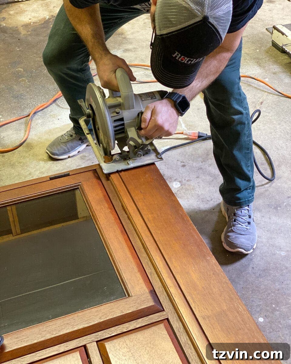 Chic Transformation of a Footed Grasscloth Buffet 4 Step 2: Using a circular saw to remove the buffet's base and prepare for new decorative feet