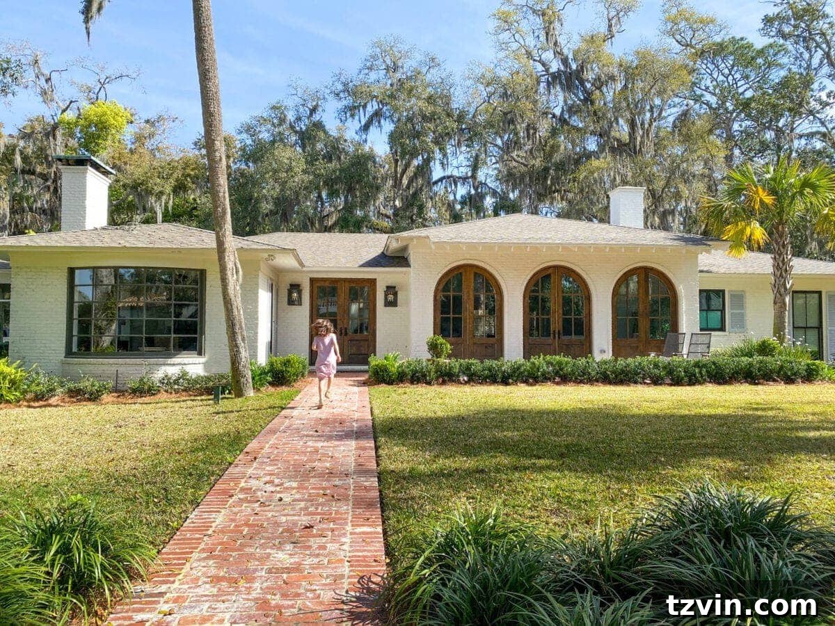 Coastal Elegance Sea Island Home Showcase 2 Sea Island Coastal House Exterior with Brick Pavers and White Brick