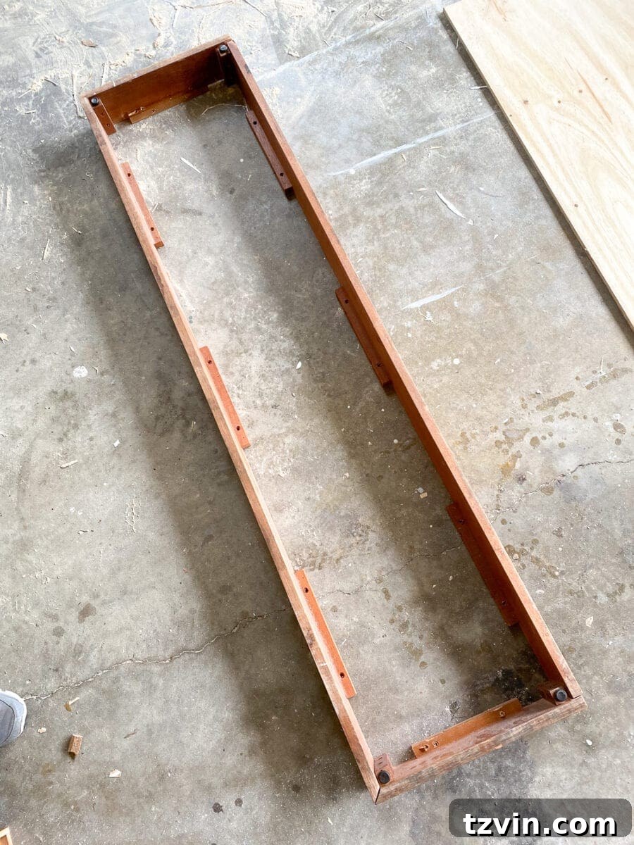 DIY Wall Planter crafted from scrap wood, ready for succulents