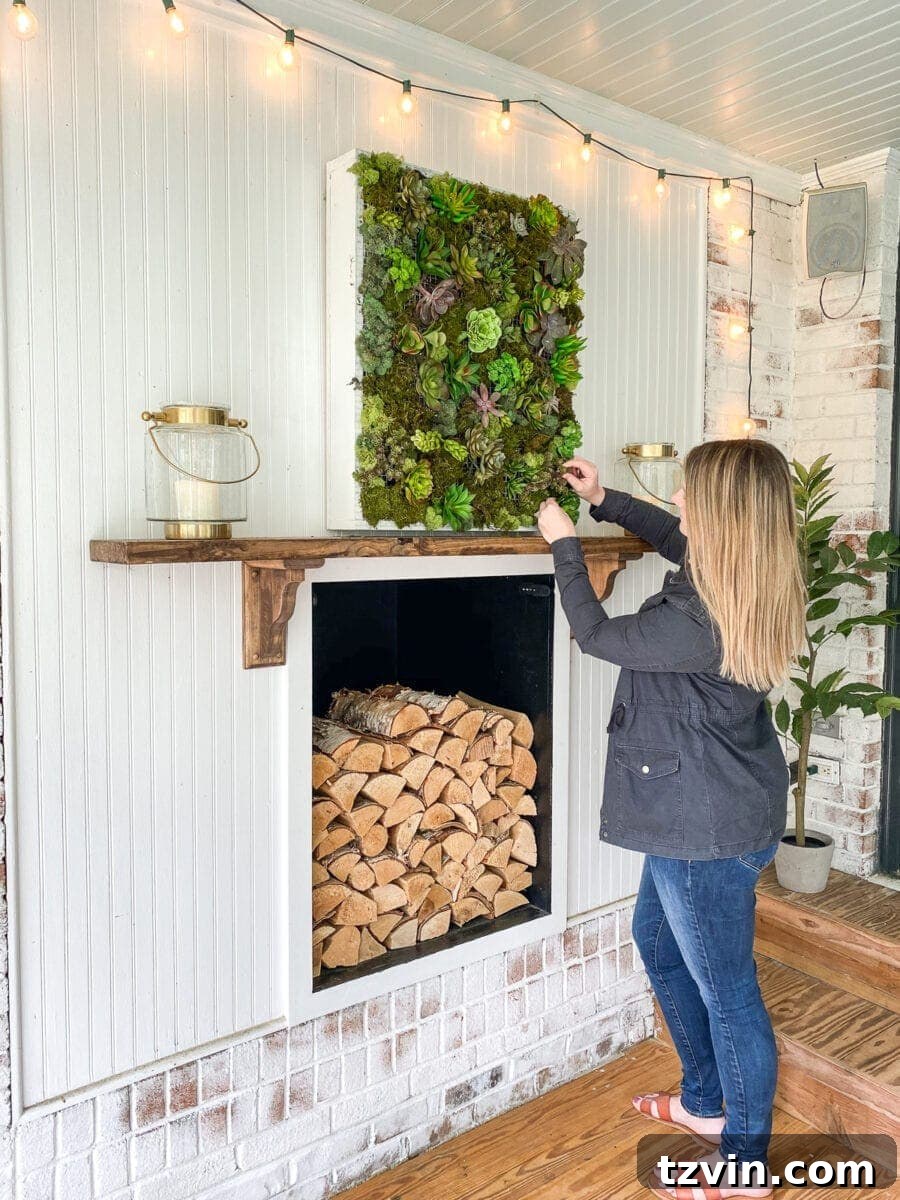 Completed DIY vertical succulent wall planter displayed outdoors