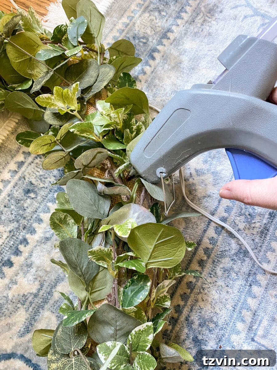 Pool Noodle Wreath Creation 10 Adding Greenery to the Wreath