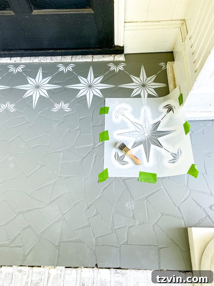 Aligning and Taping Stencil on Porch Floor for Painting