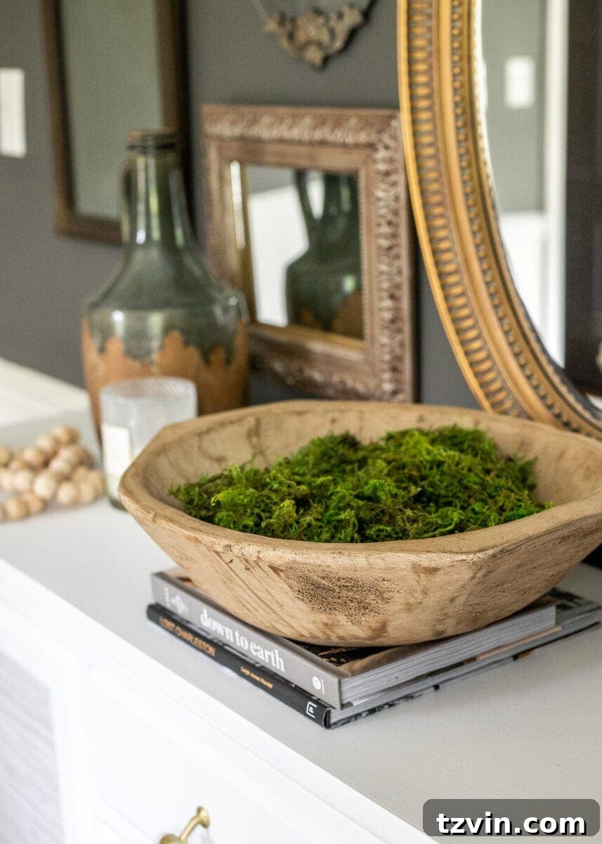 Büfeden Her Köşeye: Kusursuz Stil Rehberi 8 Buffet featuring a fresh green plant as a key decorative element