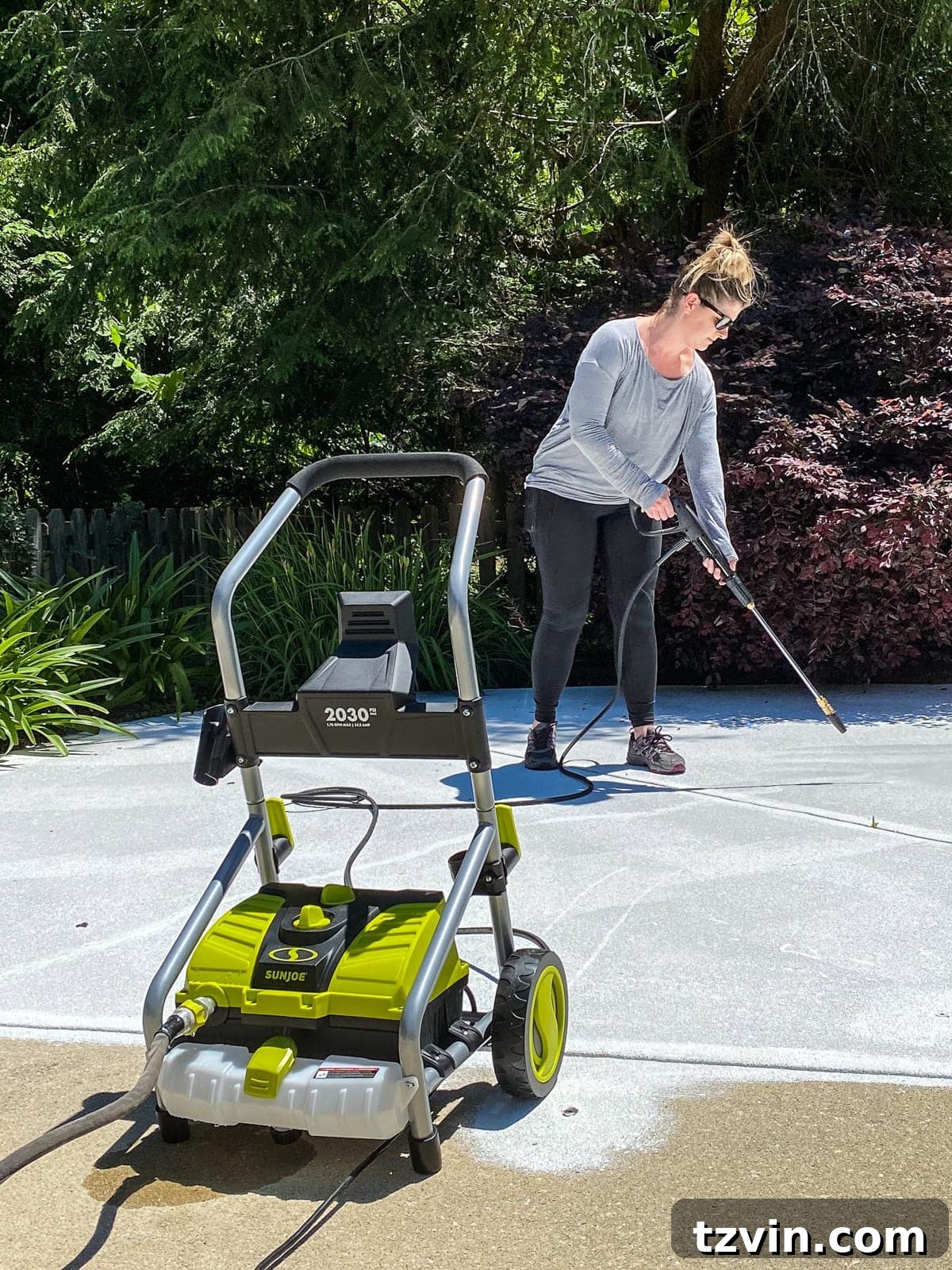 power washing concrete before painting around a pool