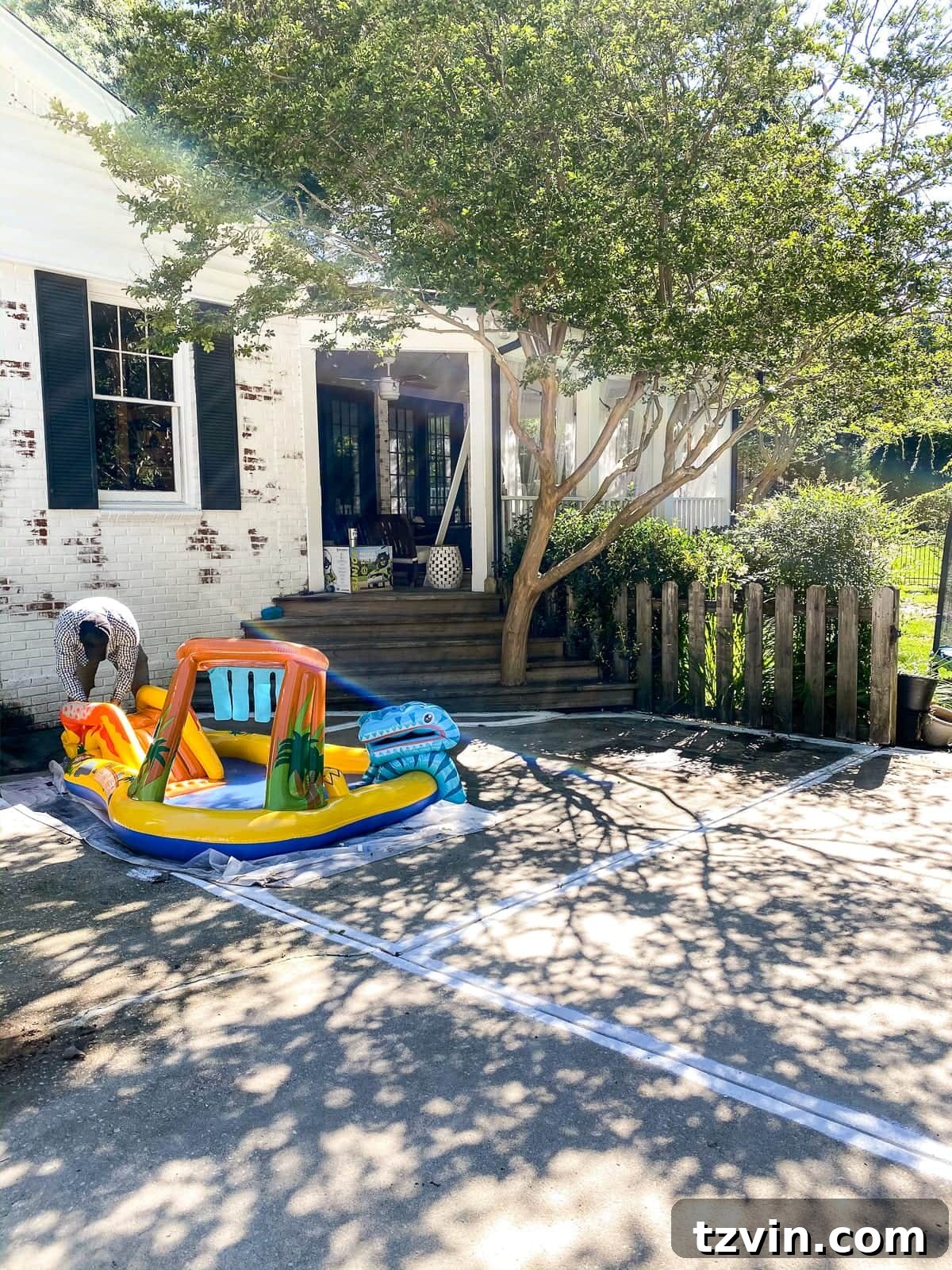 pool deck and patio before with paint mistake