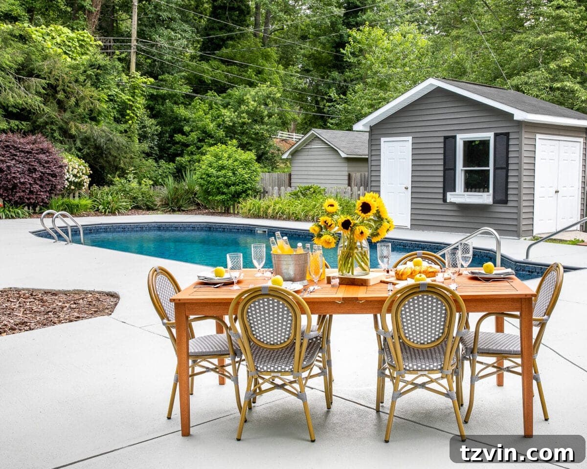 Summer Patio Refresh and Al Fresco Dining Oasis 9 Inviting outdoor dining space on a sunny day, showcasing the completed patio renovation and vibrant tablescape.