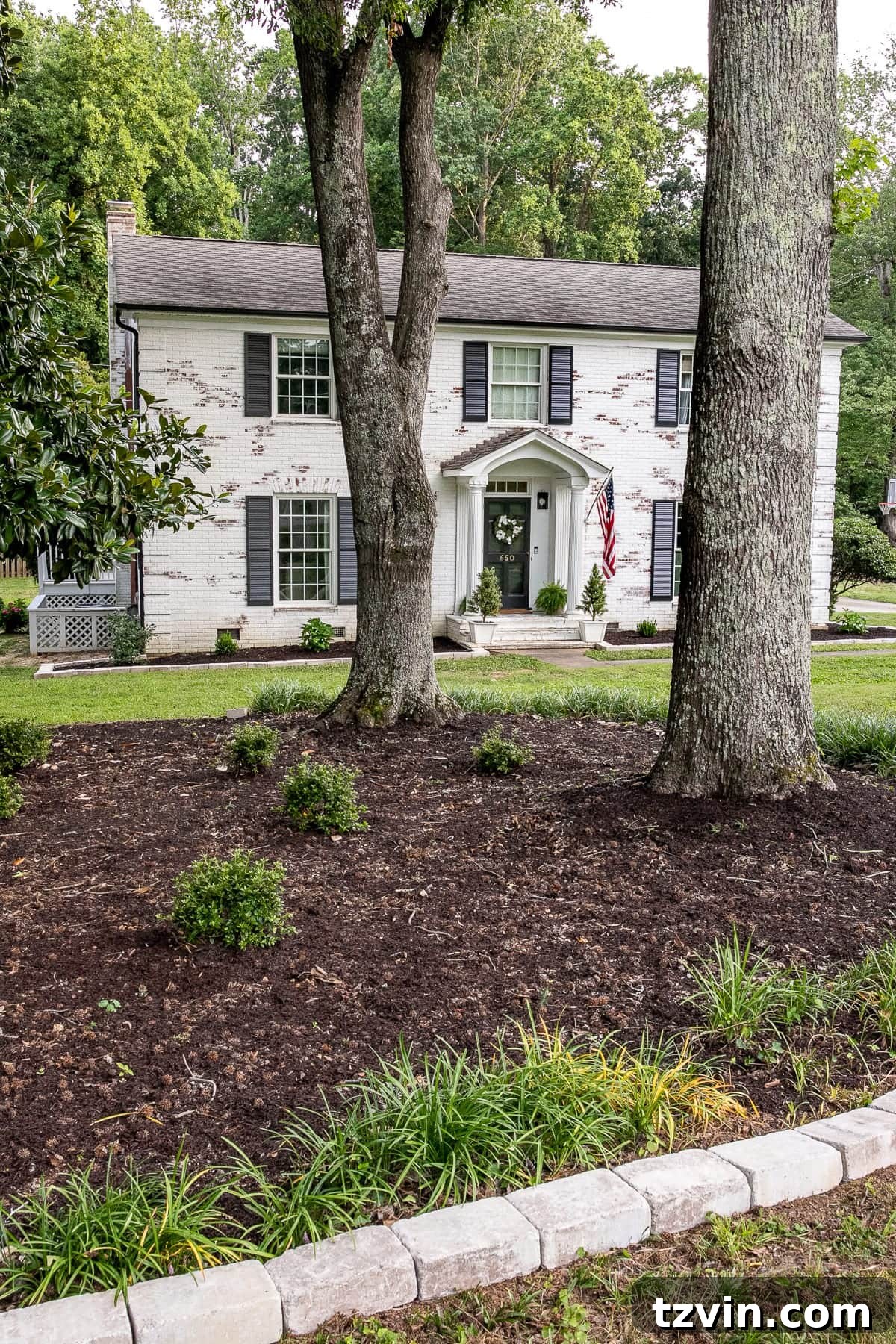 DIY Front Yard Flower Bed Glow Up 22 Panoramic view of the entire front yard after the flower bed makeover