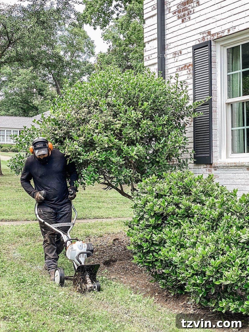 DIY Front Yard Flower Bed Glow Up 8 Using a STIHL Yard Boss with edger attachment to create clean garden borders