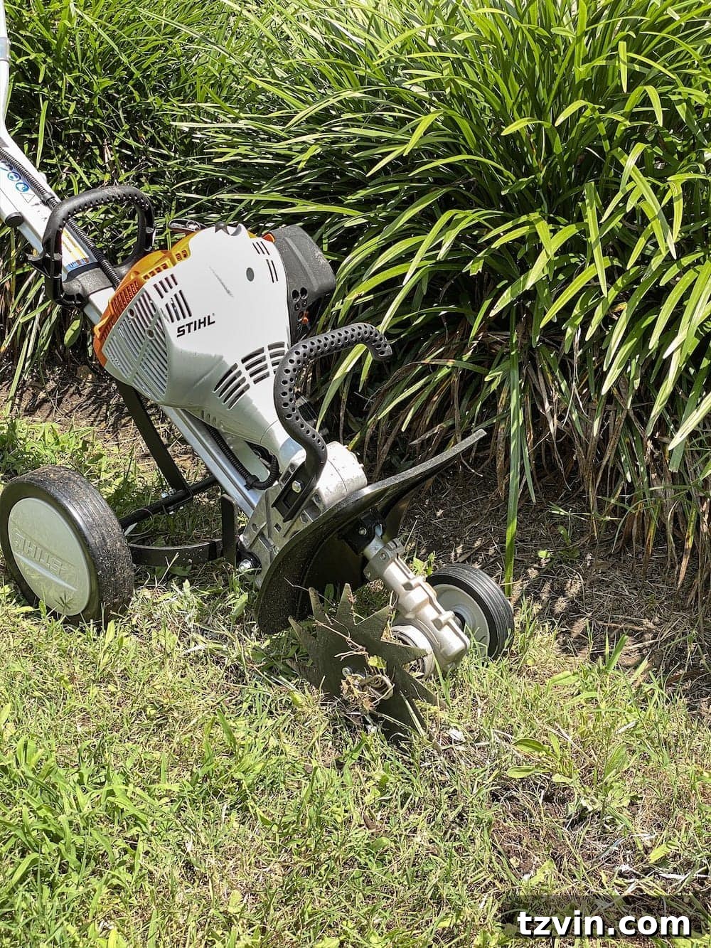 DIY Front Yard Flower Bed Glow Up 9 Close-up of the STIHL edger attachment creating a sharp edge
