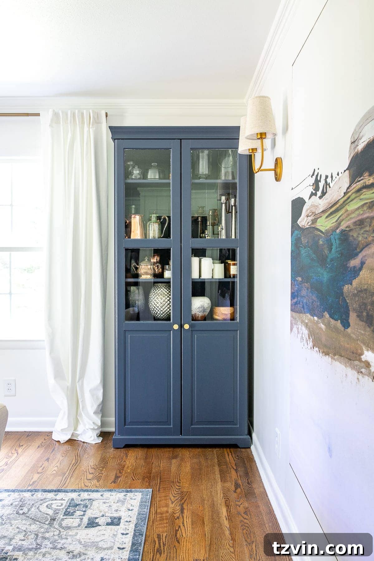 Our Home Office Transformation Unveiled 9 Elegant office storage cabinets painted in Benjamin Moore Hale Navy, providing ample, organized storage in the home office.