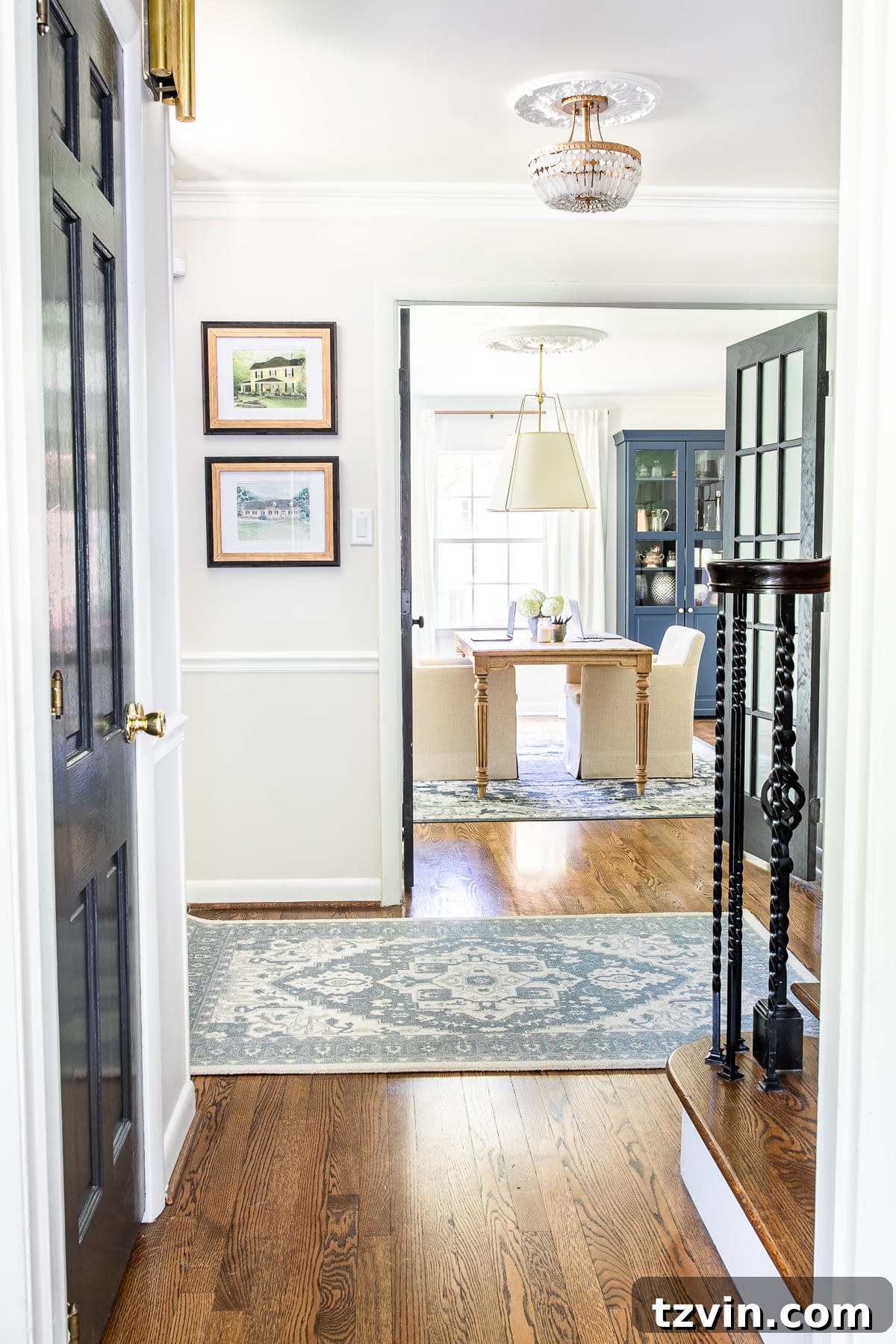 Foyer Fusion: Classic Charm Meets Modern Edge 11 Classic timeless modern foyer with childhood home art