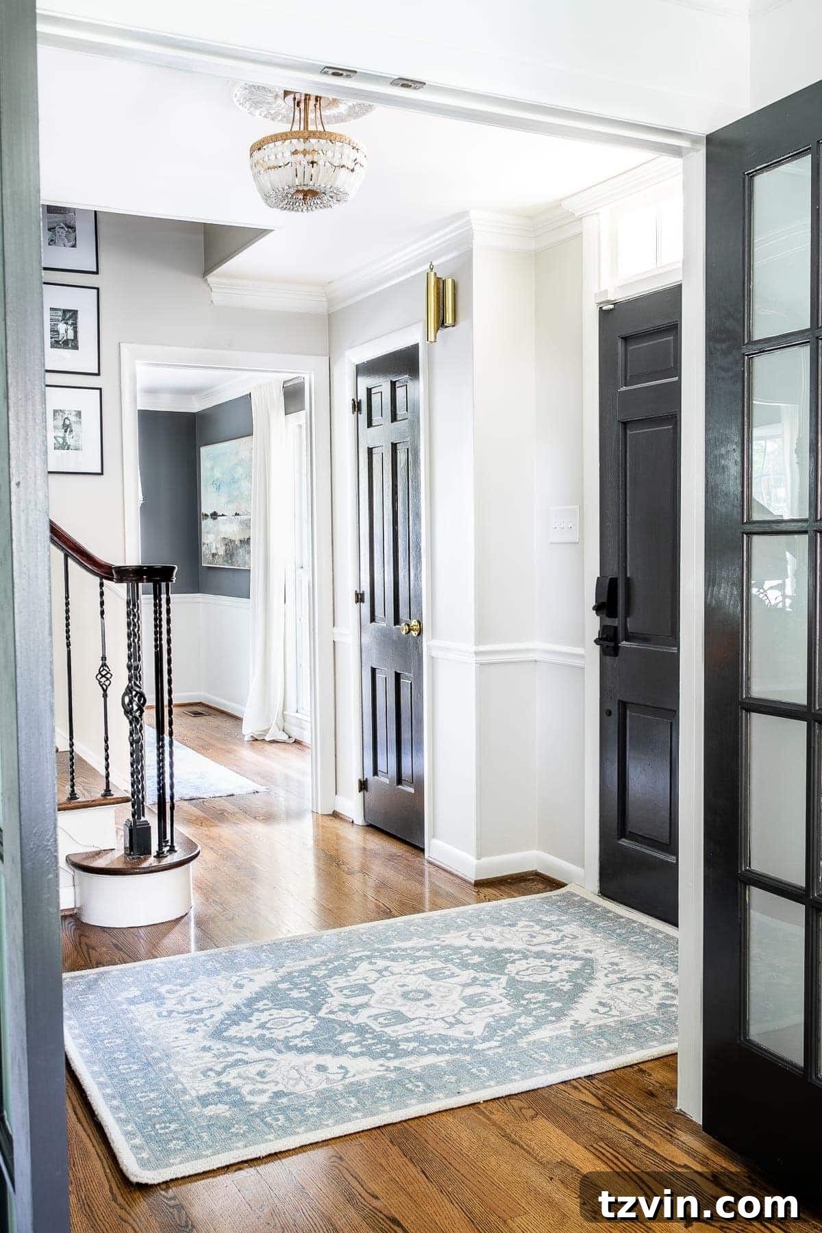 Foyer Fusion: Classic Charm Meets Modern Edge 10 Classic timeless modern foyer with black doors