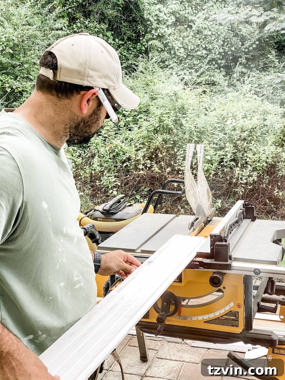 A person uses a table saw to precisely cut shiplap boards, demonstrating the importance of accurate measurements for a perfect fit, especially near corners.