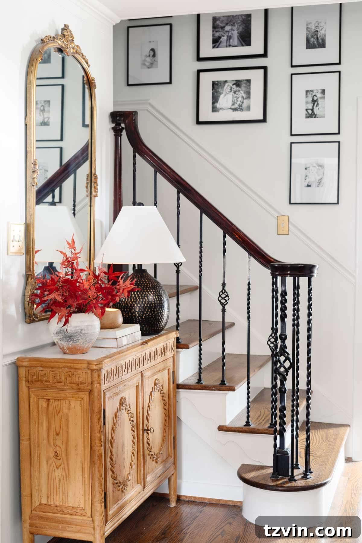 Fall Home Comforts: DIY Inspiration 16 fall leaves in a vase for simple fall decor in a foyer