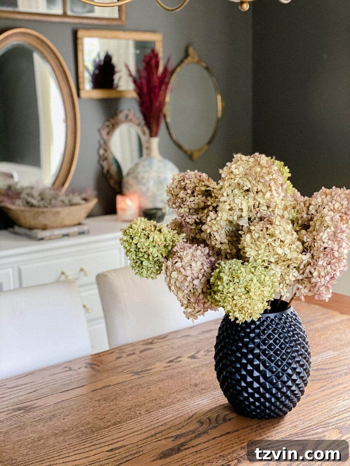 Fall Home Comforts: DIY Inspiration 3 dried hydrangeas used as DIY fall decor to create a cozy home in a dining room