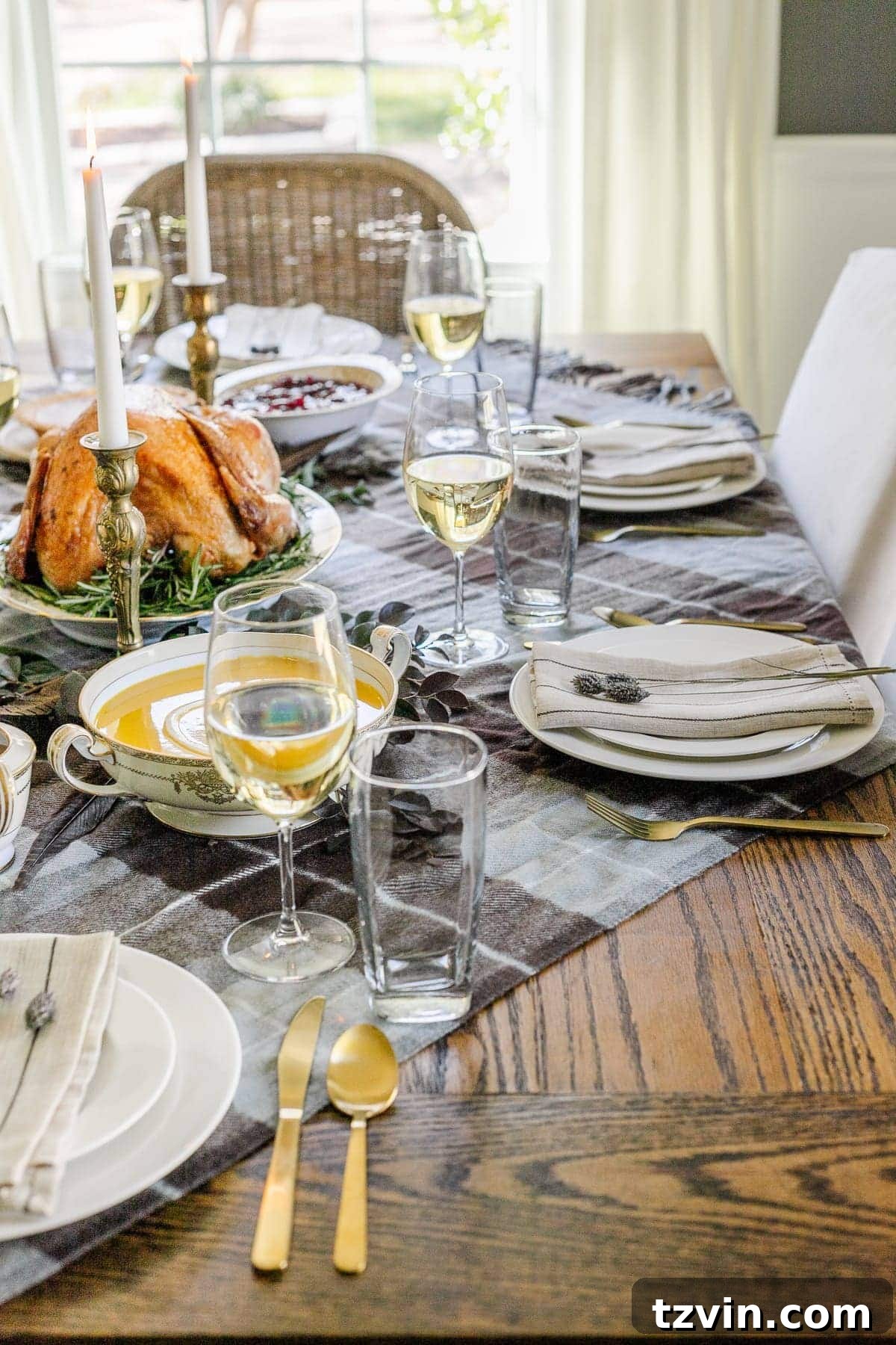 Fall Home Comforts: DIY Inspiration 25 plaid throw blanket used on a dining table as a tablecloth to set the mood of a cozy home