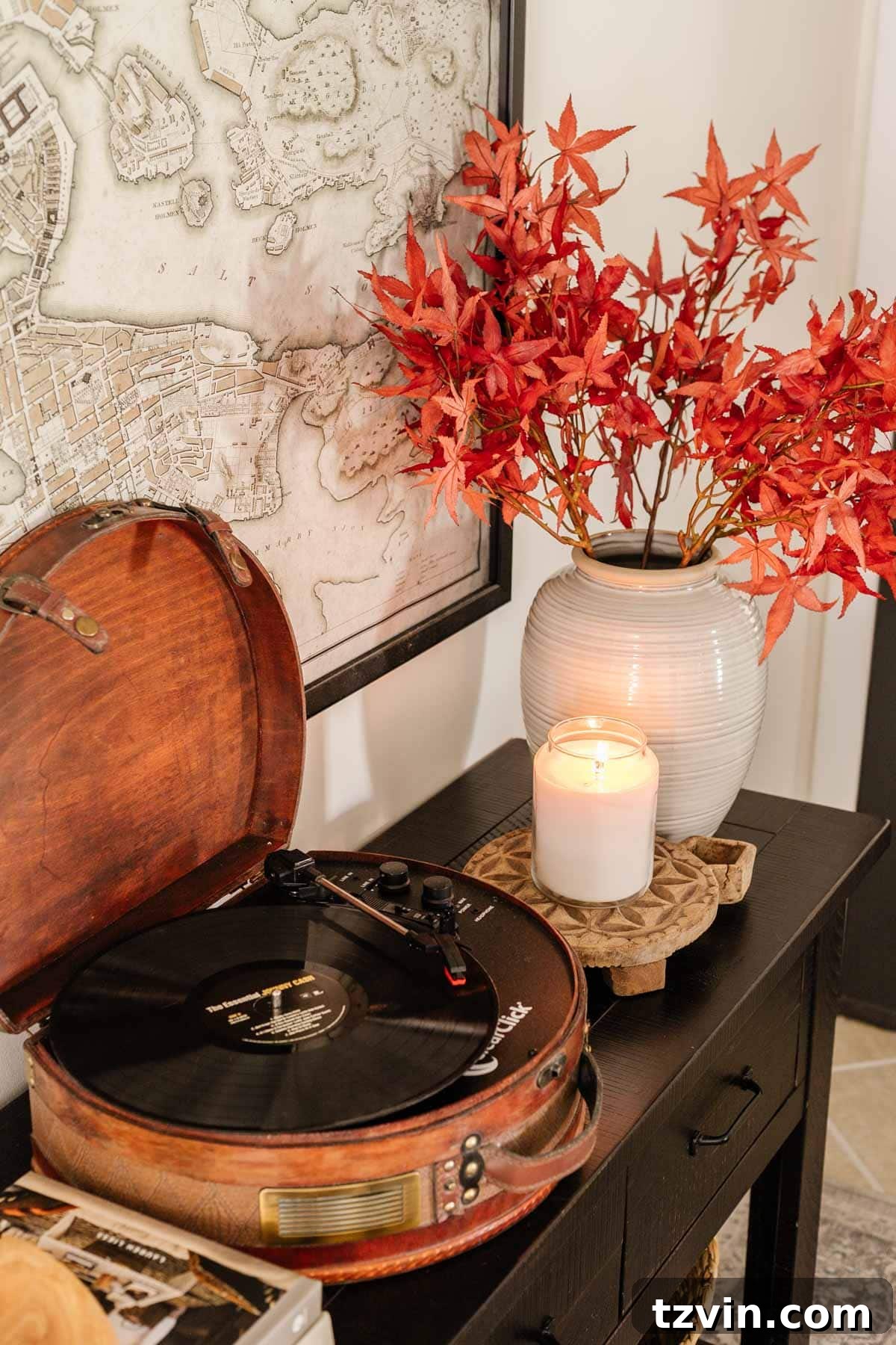 Fall Home Comforts: DIY Inspiration 27 record player and vase of fall leaves