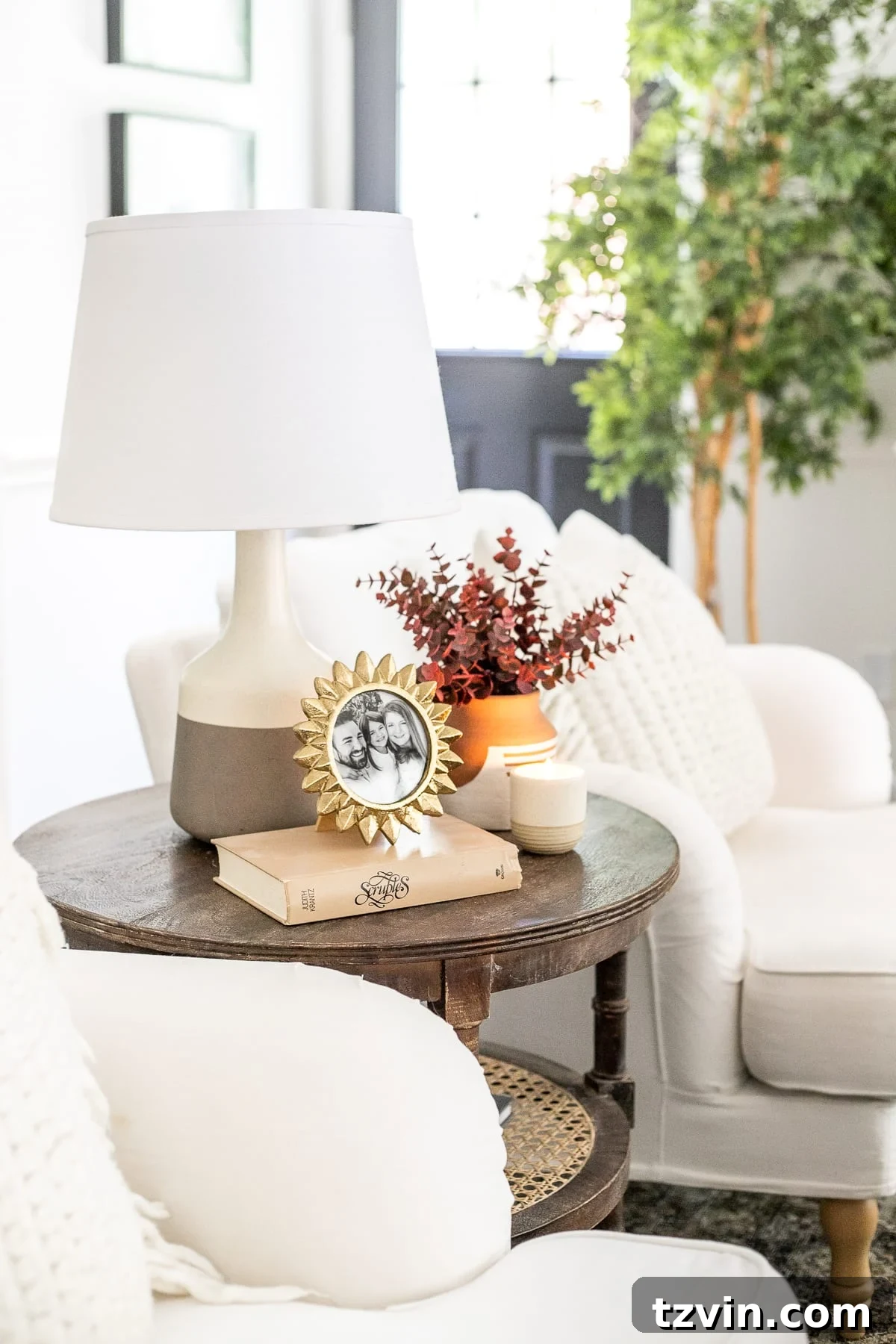 living room end table with fall stems in vase