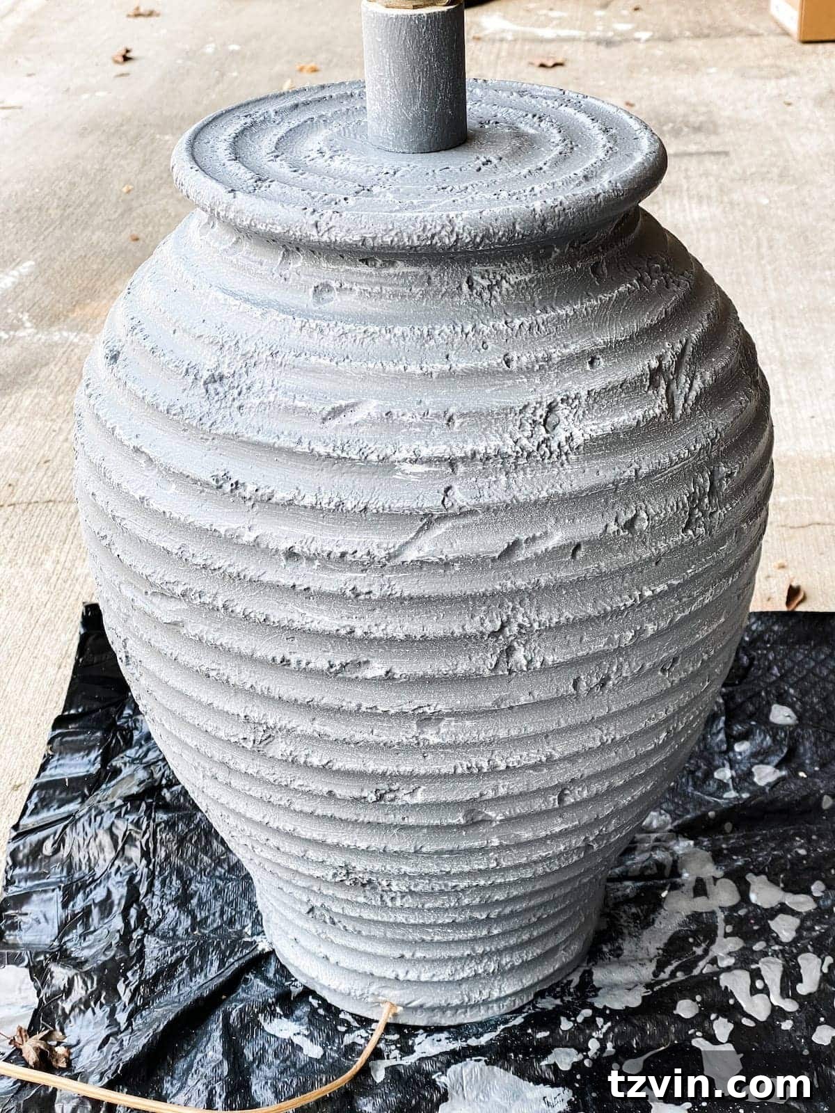 Lamp base after the dry brushing step, showcasing the added weathered and textured effect.