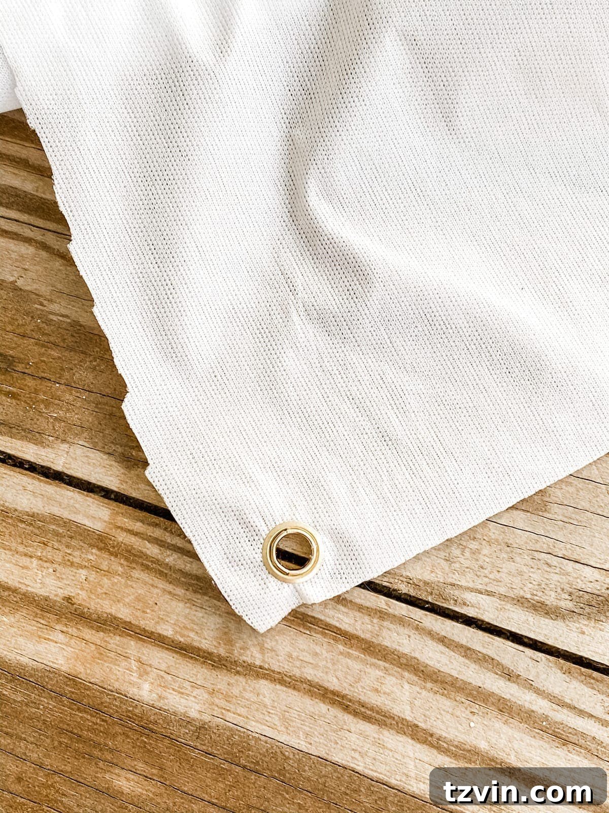 Fall Porch Magic: DIY Outdoor Movie Nights and Smores Bar 12 DIY outdoor movie screen from a shower curtain liner, installing eyelets