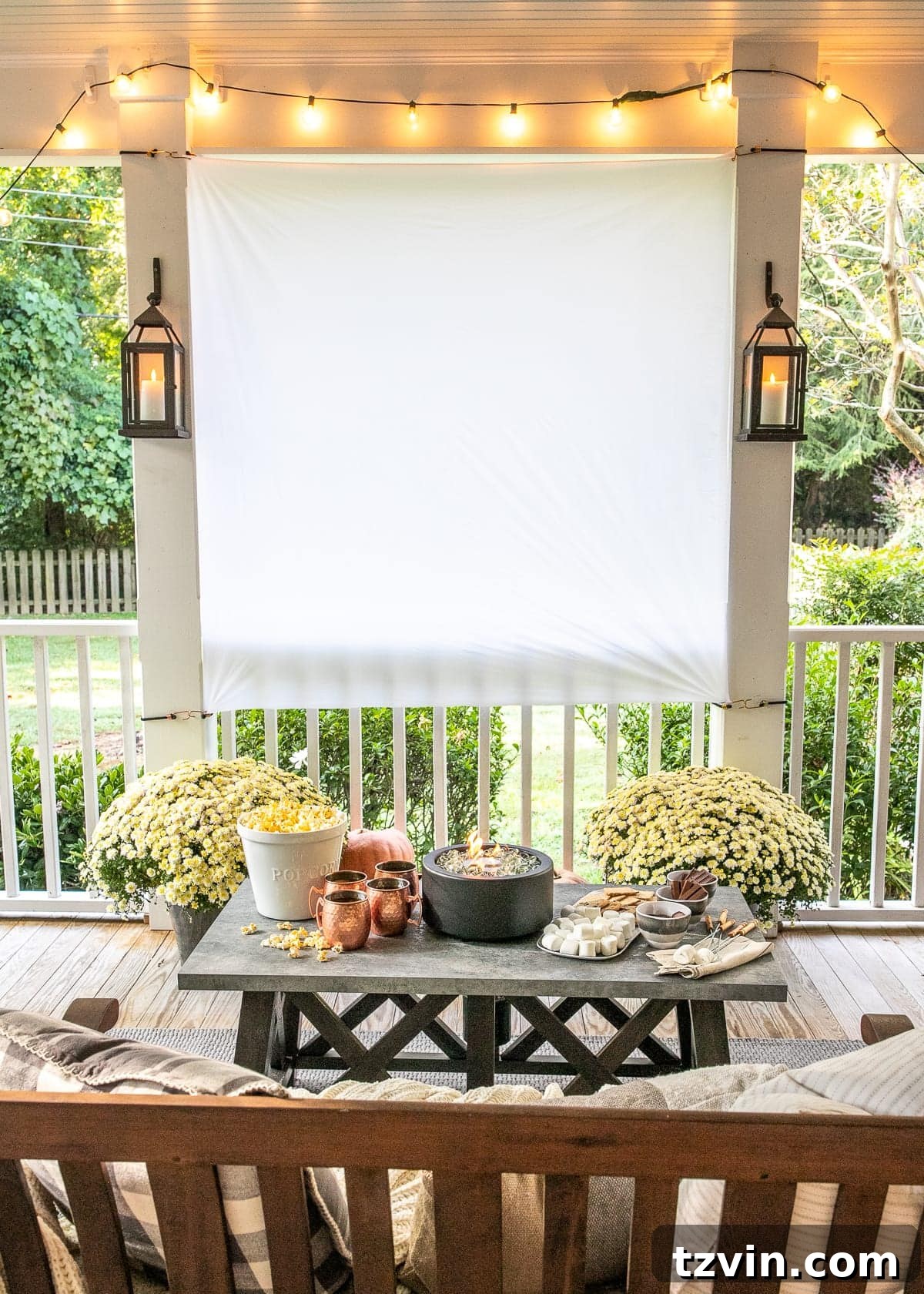 Fall Porch Magic: DIY Outdoor Movie Nights and Smores Bar 14 DIY Outdoor Movie Screen and DIY S'mores Table on Fall Back Porch, movie playing